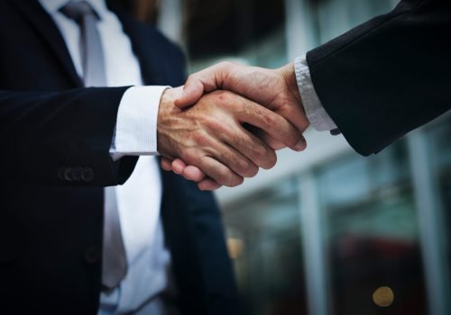 Business handshake agreement partnership deal